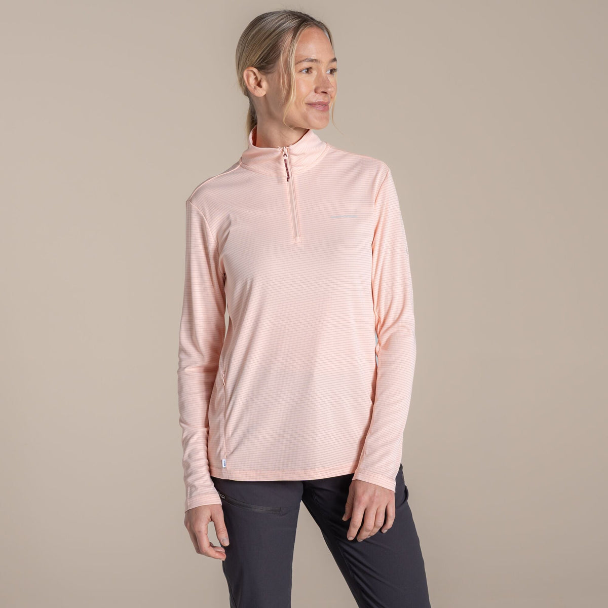 Woman wearing the Craghoppers Women's NosiLife SolarShield+ Half Zip Top
